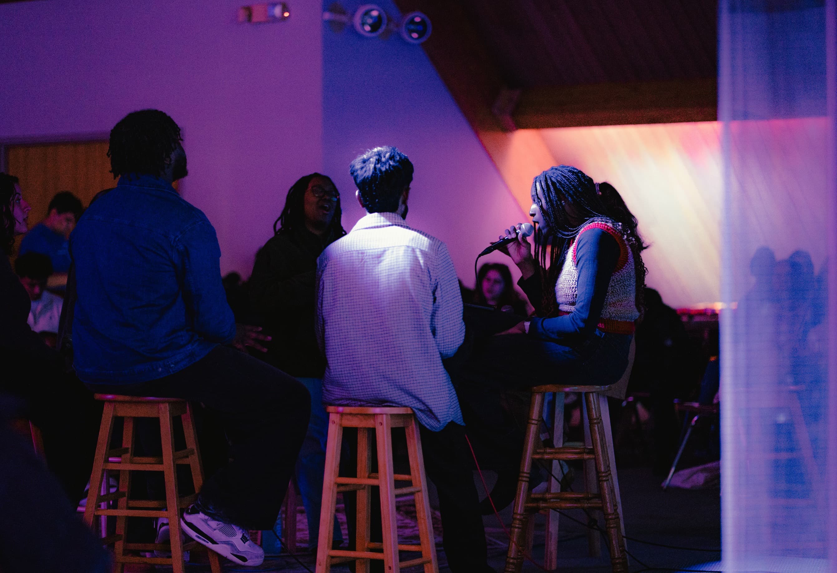 Intimate acoustic worship in purple light